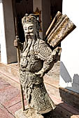 Bangkok Wat Pho, chinese style door guardians of the gallery of the eastern courtyard of the temple compund. 